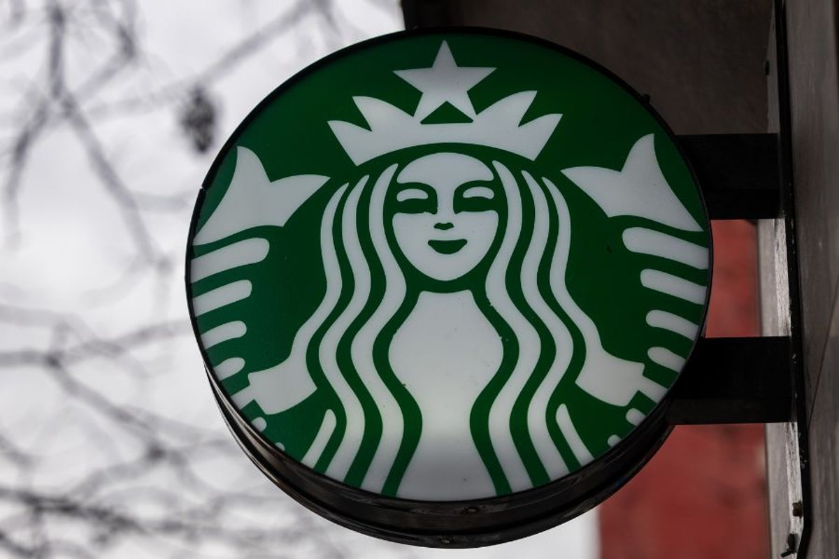 Starbucks to close stores and lay off hundreds of staff in $1 billion restructure